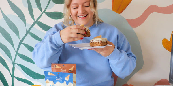 A woman grabs a bite of Pumpkin Sheet Cake.