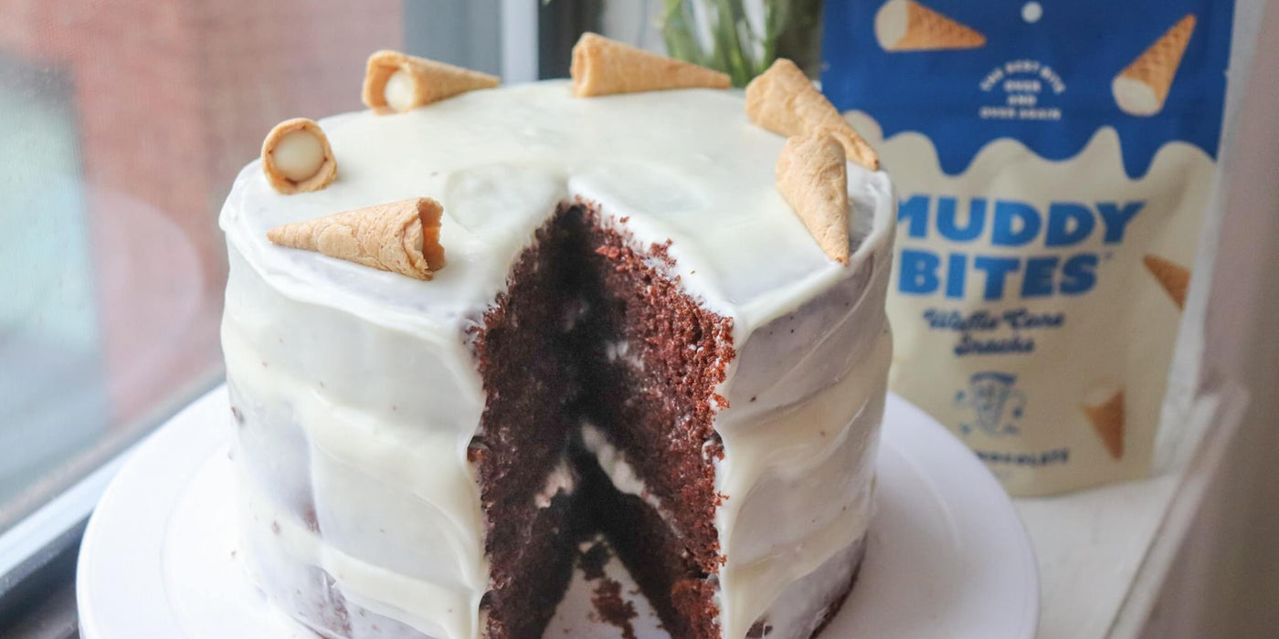 Chocolate cake with creamy white buttercream and Muddy Bites for added flavor